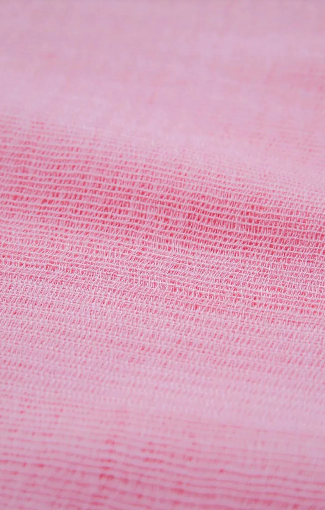 Tabbisocks' Supima Organic Cotton Scarf in Sakura, a light pink color inspired by Japanese cherry blossoms