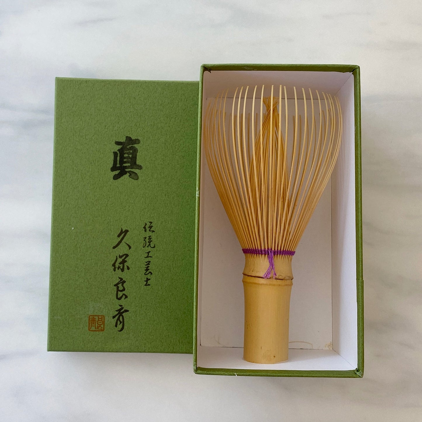 White Whisk with Colored Thread