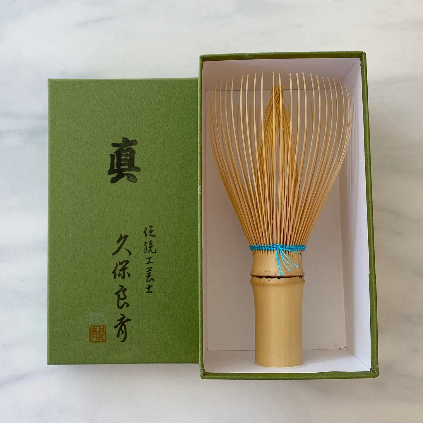 White Whisk with Colored Thread