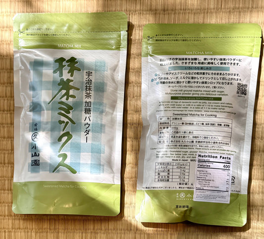 Two packages of matcha powder on tatami mat in the sunlight