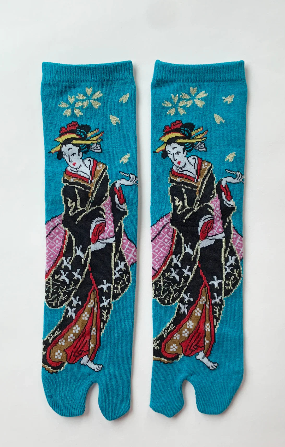 This is a photo of the teal color of the product name KABUKI TABI TOE SOCKS of the brand name NINJA SOCKS