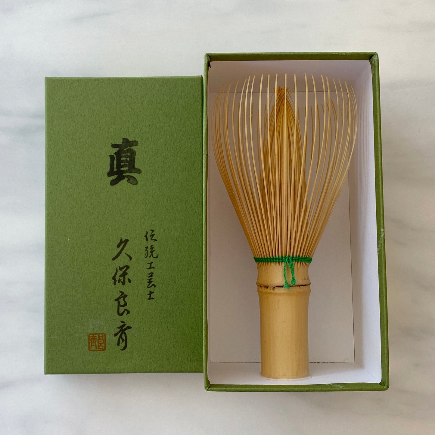 White Whisk with Colored Thread