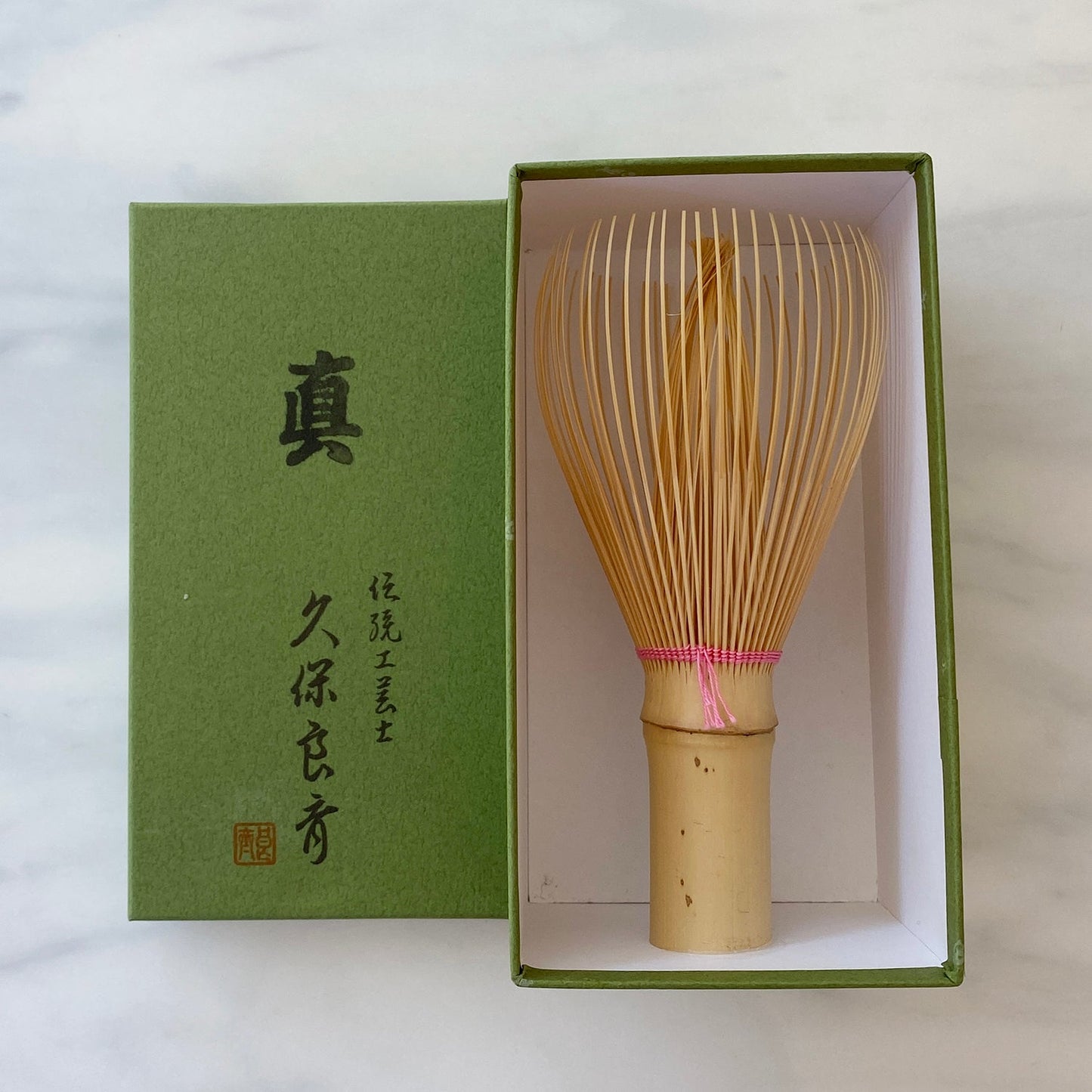 White Whisk with Colored Thread