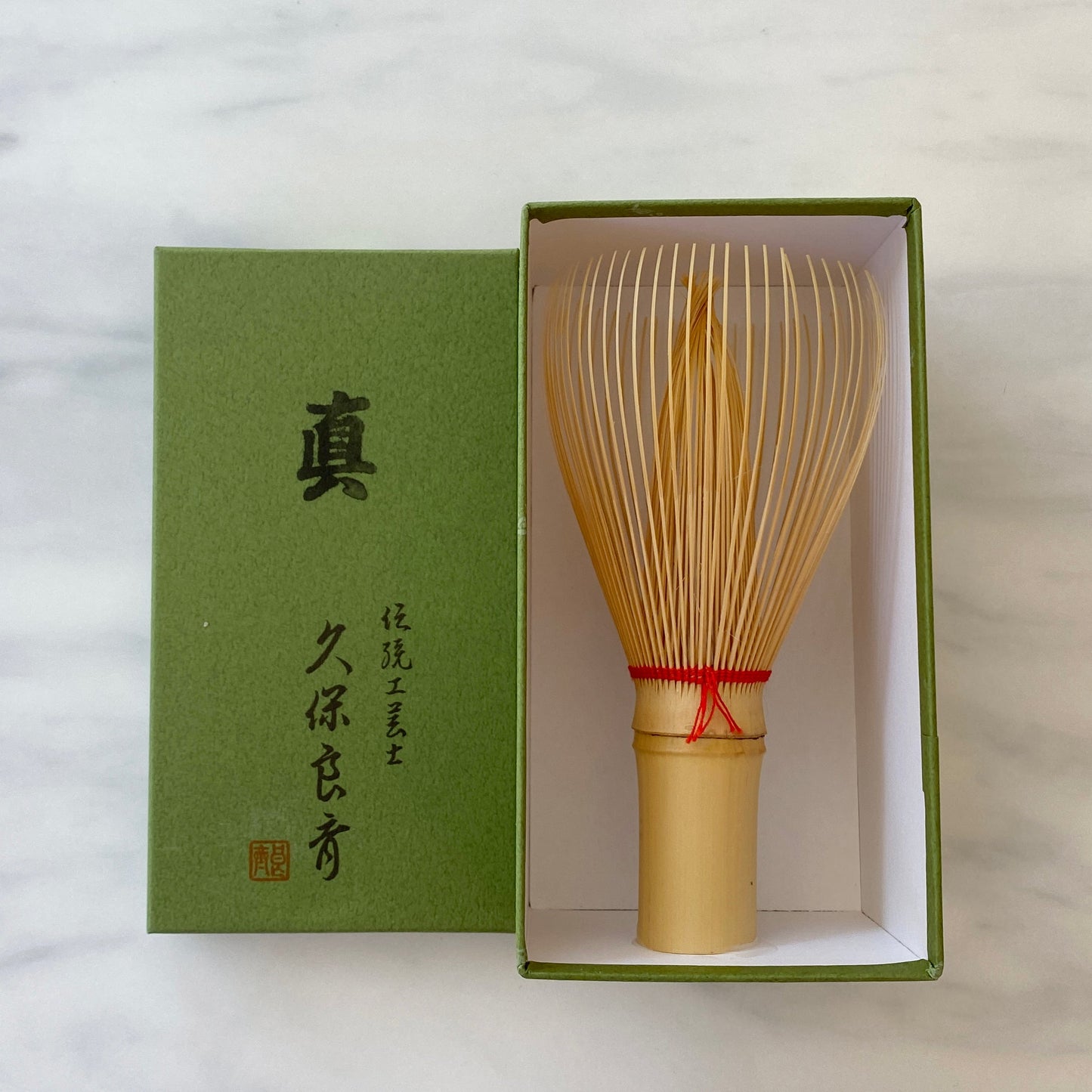 White Whisk with Colored Thread